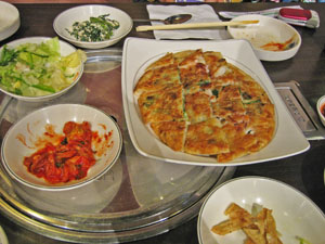 �p�W����